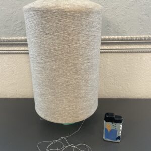 Garnrulle. Fint maskingarn grå